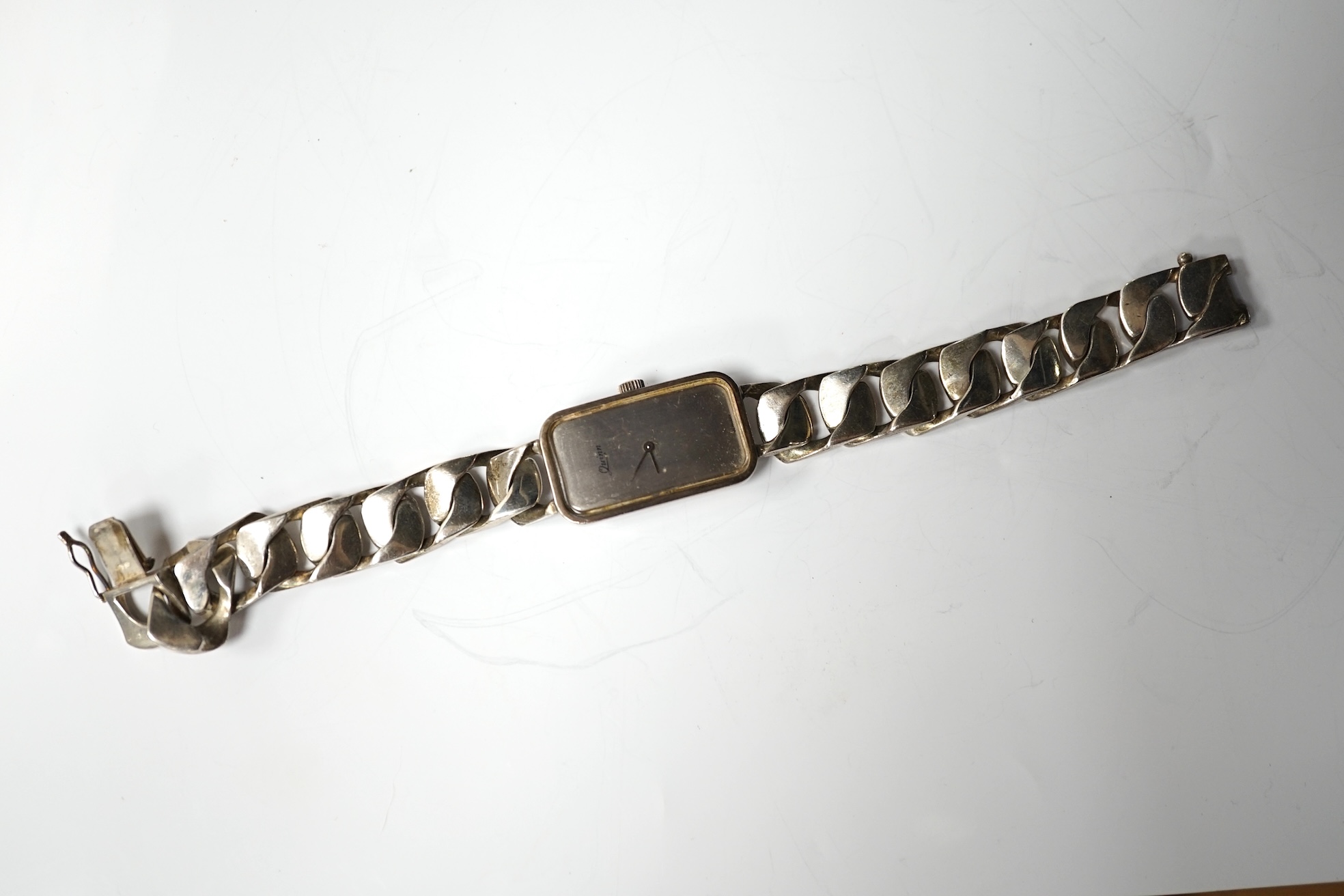 A lady's modern 925 Quinn wrist watch, with heavy silver curb link bracelet and two other wrist watches including a Smiths Empire. Condition - poor to fair